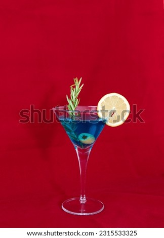 martini rosso bianco d'ore rosato extra dry diero varieties spices fruits party invitation organization bar night club pre-dinner snack elegance yellow red green blue alcohol glass drink coctail cold  Royalty-Free Stock Photo #2315533325