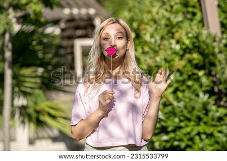 cute girl lovely pretty young blonde girl in hat in the summer at the park very sweet Royalty-Free Stock Photo #2315533799