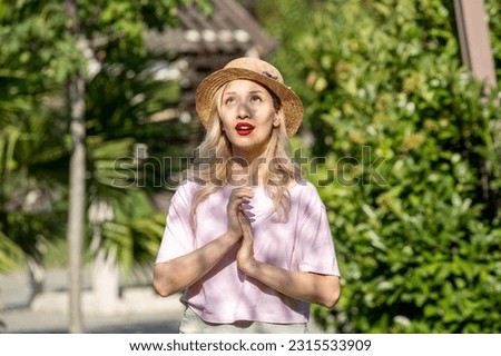 cute girl in the summer at the park young lovely pretty blonde girl in hat enjoying life Royalty-Free Stock Photo #2315533909