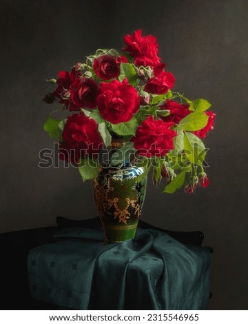 Still life with bouquet of red roses 