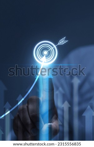 Businessman analyzing company financial balance sheet working with digital virtual graphics Businessman calculating financial data for long term investment growth goals, vertical	 Royalty-Free Stock Photo #2315556835