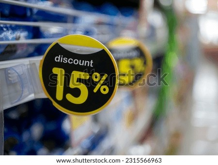 15 % discount text, tag, badge in the supermarket, copy space, shallow focus