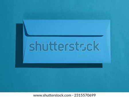 Rectangular blue envelope on blue background