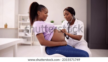 Regular Prenatal Checkup In Maternity Center. Pregnancy And Childbirth Royalty-Free Stock Photo #2315571749