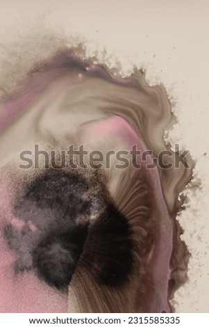 Ink blot and watercolor pour flow color on wet beige paper background. Royalty-Free Stock Photo #2315585335