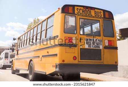 Yellow school bus symbolizes education, childhood, learning, community, safety, and the journey of knowledge