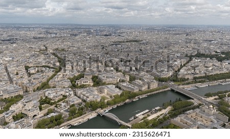 panoramic view of paris, showing the river seine, the arc de triomphe, the streets and parks of paris, view from the top of the eiffel tower, view of avenue des champs-élysées