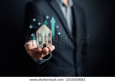 Property interest research best rate, Man selected house finance loan increase.investment planning.business real estate.profit of banking. investor thinking strategy