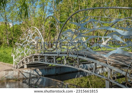 Odessa, Ukraine 05.05.2023. Bridge in the Victory park in Odessa, Ukraine, on a sunny spring day