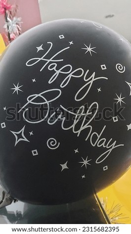 Write happy birthday on the balloon