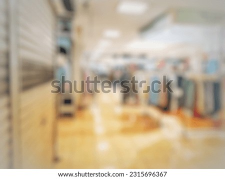 Empty blurry mall background. defocus business office interior. Light lifestyle shopping mall or supermarket. Suitable for card or site design