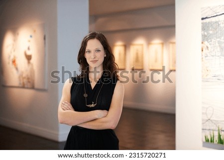 Pride, arms crossed and portrait of a woman at an art gallery for an exhibition. Creative, culture and a museum manager with management of paintings, collection and curator of pictures at a studio Royalty-Free Stock Photo #2315720271