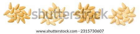 Roasted pine nuts isolated on the white background, top view. Royalty-Free Stock Photo #2315730607