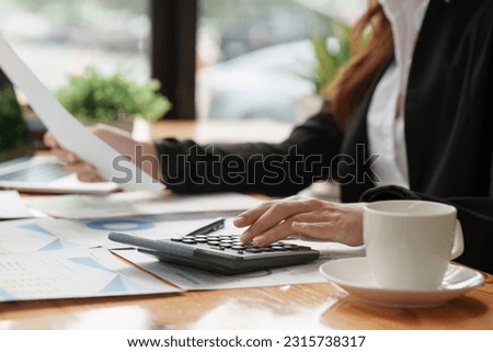 Accountant woman working on laptop and do document, tax, exchange, research, accounting and Financial advisor concept