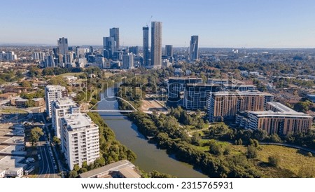 Aerial drone view of Parramatta CBD above Parramatta River in Greater Western Sydney, NSW, Australia showing development of the city as at June 2023 Royalty-Free Stock Photo #2315765931