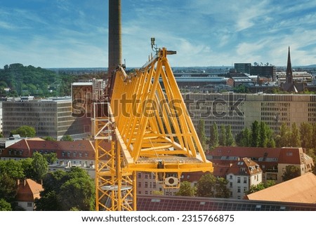 high angle view of a Tower crane on a construction site of a building