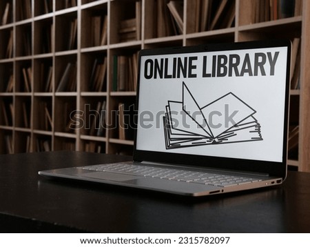 Online Library is shown using a text on the screen of laptop and photo of the bookshelf