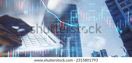 Close up of female hands using laptop on abstract wide city background with forex chart and grid. Financial growth, technology and communication concept. Double exposure