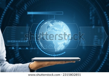 Close up of female hand holding cellphone with reative glowing blue map or globe hologram on dark background. Earth, metaverse and technology concept