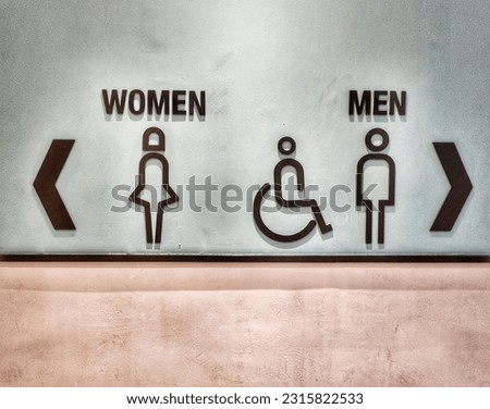 toilet sign women to the left and men to the right