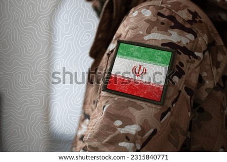 Iran Soldier, Soldier with flag Iran, Iran flag on a military uniform, Iran army, Camouflage clothing