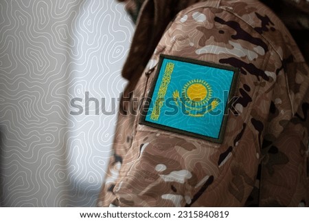 Kazakhstan Soldier, Soldier with flag Kazakhstan, Kazakhstan flag on a military uniform, Kazakhstan army, Camouflage clothing