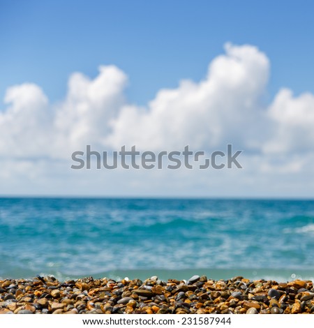 Bright picture of seashore with blue sky and turquoise sea