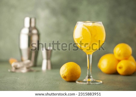 Homemade Limoncello spritz drink of liqueur, sparkling wine and lemon in cocktail glass Royalty-Free Stock Photo #2315883951