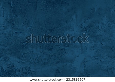 Abstract decorative dark blue plaster wall background