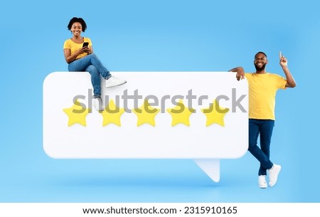 Five Star Customers Feedback. African American Couple Using Phone Posing With Huge Rating Icon, Recommending Online Mobile Service On Blue Studio Background. Application Advertisement. Collage Royalty-Free Stock Photo #2315910165
