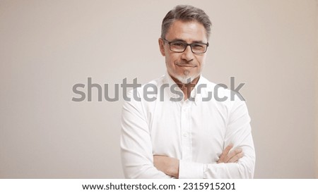 Middle age businessman in white business shirt. Casual entrepreneur. Portrait of mid adult, mature age man, happy smiling. Isolated on white, copy space. Royalty-Free Stock Photo #2315915201