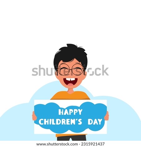 Happy child holding a sign with the inscription happy children's day.