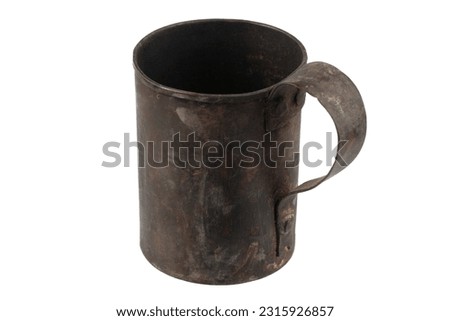 Antique army vintage brass mug isolated on a white background