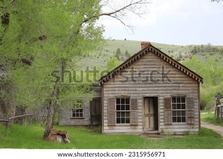 Abandoned home in ghost town Royalty-Free Stock Photo #2315956971