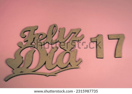 Happy 17th wooden on pink background