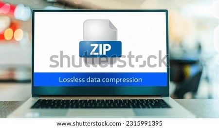Laptop computer displaying the icon of ZIP file