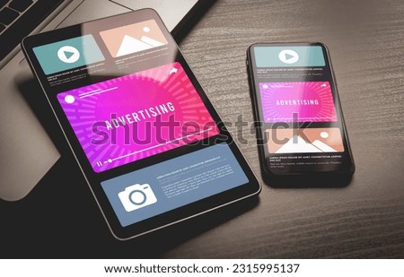 Programmatic Advertising for maximize ads impact concept. Online rich media native advertising targeting marketing strategy. Programmatic video advertising block on mobile phone and tablet pc screen Royalty-Free Stock Photo #2315995137