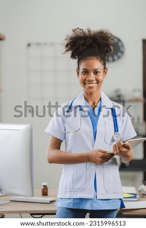 African american woman doctor standing in her clinic office