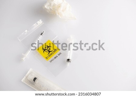 Biohazard specimen plastic bag on a white background