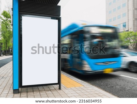 Blank white Mock up Banner signboard Media Advertisement Bus stop City street Royalty-Free Stock Photo #2316034955
