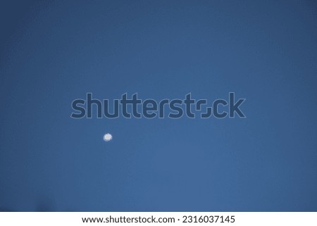 The Moon and The Beautiful Sky in Afternoon at Asia