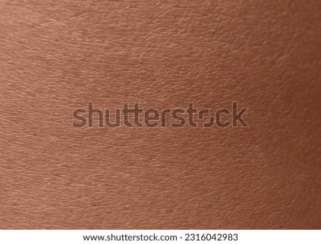 Human skin texture background,brown skin Royalty-Free Stock Photo #2316042983
