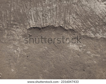 Grunge damaged concrete floor photo taken at daylight