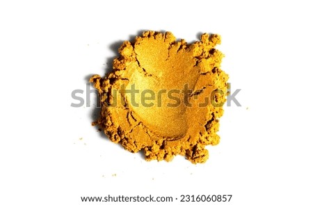 Gold powder isolated on white background. Golden metallic dry paint rotating, close up. Cosmetic, shimmer, art paint. Texture of gold metal powder close up Royalty-Free Stock Photo #2316060857