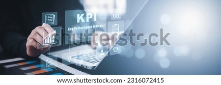 Key Performance Indicator Planning KPI, Company Management Business Internet Technology Concept, Businessman using a laptop with document management, enterprise resource management software system Royalty-Free Stock Photo #2316072415