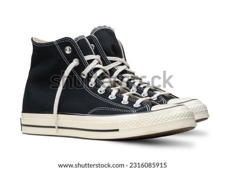 High black sneakers isolated on white background Royalty-Free Stock Photo #2316085915