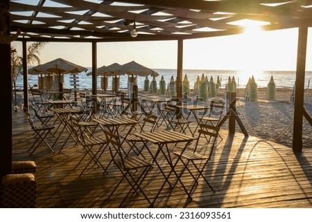 Sicily - Marzamemi: beach and sea view tables on the beach along the coast