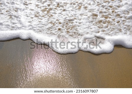 Smooth sandy beach and beautiful waves. picture for background