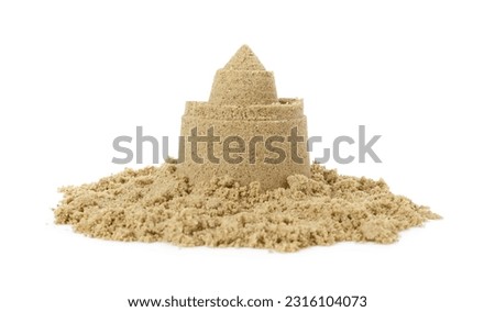 Pile of sand with beautiful castle isolated on white