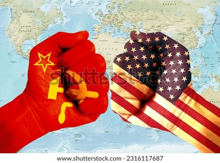 Repeated exposure of USSR and USA flags with fists. A metaphor for the Cold War between the two countries. Flag of the USSR (1922-1991). American flag (50 stars) Royalty-Free Stock Photo #2316117687